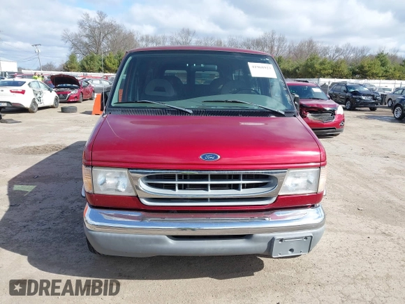 1999 Ford Econoline Passenger XL with VIN 1FMRE11L1XHA05657, listed as a IAAI auction lot 41968923 with 150,868 mi miles and . Bid and sale history available at carsss.com. Image 12.