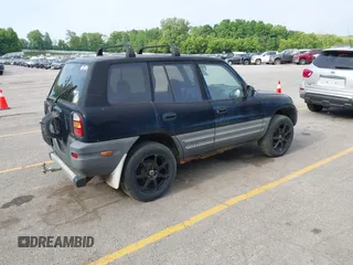 1999 Toyota RAV4 with VIN JT3HP10V2X7120498, listed as a IAAI auction lot 42409235 with 215,769 mi miles and . Bid and sale history available at DreamBid. Image 4.