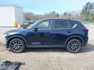 2018 Mazda CX-5 Touring z VIN JM3KFBCM4J0379871, wystawiony jako IAAI lot #41865130 z przebiegiem 48 674 mil mil oraz . Historia ofert i sprzedaży dostępna na DreamBid. Obrazek 15.
