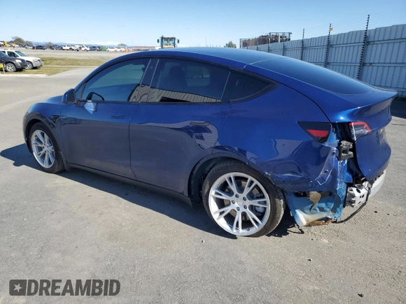 2021 Tesla Model Y Long Range z VIN 5YJYGDEE6MF089493, wystawiony jako Copart lot #48349575 z przebiegiem 52 245 mil mil oraz Szkoda całkowita • Salvage title. Historia ofert i sprzedaży dostępna na DreamBid. Obrazek 2.