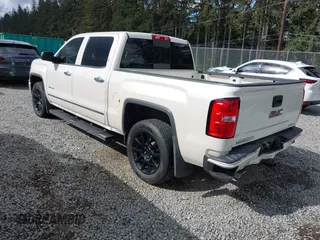 2014 GMC Sierra 1500 Denali z VIN 3GTU2WEJXEG527496, wystawiony jako IAAI lot #42211521 z przebiegiem 151 974 mil mil oraz . Historia ofert i sprzedaży dostępna na DreamBid. Obrazek 3.