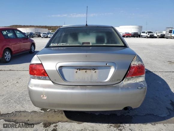2004 Mitsubishi Lancer ES with VIN JA3AJ26E04U069574, listed as a Copart auction lot 77494574 with 171,068 mi miles and Clean Title. Bid and sale history available at carsss.com. Image 6.