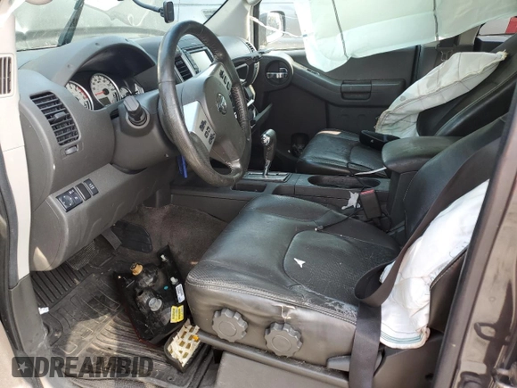 2015 Nissan Xterra Pro-4X z VIN 5N1AN0NWXFN664591, wystawiony jako Copart lot #60423525 z przebiegiem 246 477 mil mil oraz Szkoda całkowita • Salvage title. Historia ofert i sprzedaży dostępna na DreamBid. Obrazek 7.