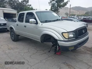 2003 Toyota Tacoma PreRunner z VIN 5TEGN92N73Z261112, wystawiony jako IAAI lot #42268799 z przebiegiem 154 266 mil mil oraz . Historia ofert i sprzedaży dostępna na DreamBid. Obrazek 1.