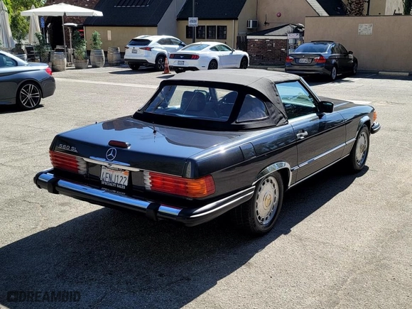 1988 Mercedes-Benz 560 Series 560SL with VIN WDBBA48D1JA077345, listed as a Copart auction lot 79681234 with 87,690 mi miles and Clean Title. Bid and sale history available at carsss.com. Image 4.