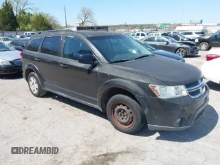 2011 Dodge Journey Mainstreet with VIN 3D4PG1FG0BT527937, listed as a IAAI auction lot 42003997 with 209,894 mi miles and . Bid and sale history available at carsss.com. Image 1.