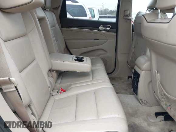 2014 Jeep Grand Cherokee Overland with VIN 1C4RJECG5EC207211, listed as a IAAI auction lot 41586309 with 115,293 mi miles. Bid and sale history available at carsss.com. Image 8.