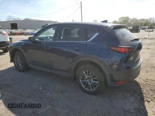 2017 Mazda CX-5 Touring with VIN JM3KFBCL4H0214579, listed as a Copart auction lot 54256775 with 95,541 mi miles and Clean Title. Bid and sale history available at carsss.com. Image 2.