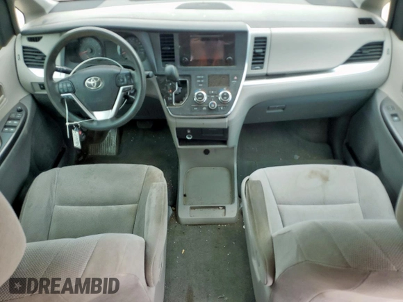 2015 Toyota Sienna L with VIN 5TDZK3DC4FS641312, listed as a Copart auction lot 63699245 with Not provided miles and Salvage title. Bid and sale history available at DreamBid. Image 8.