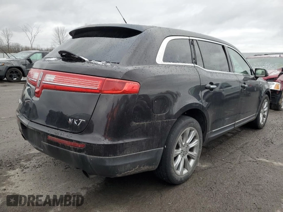 2014 Lincoln MKT with VIN 2LMHJ5FK9EBL50142, listed as a Copart auction lot 85564374 with 180,263 mi miles and Salvage Title. Bid and sale history available at DreamBid. Image 3.