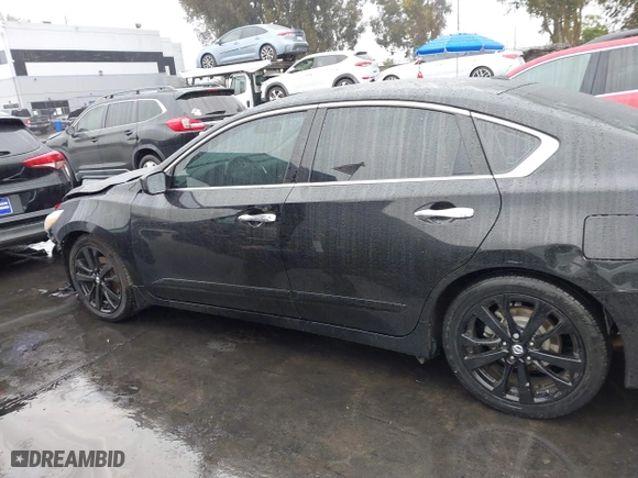 2018 Nissan Altima 2.5 SL with VIN 1N4AL3AP4JC288183, listed as a IAAI auction lot 41466582 with 100,858 mi miles. Bid and sale history available at carsss.com. Image 14.