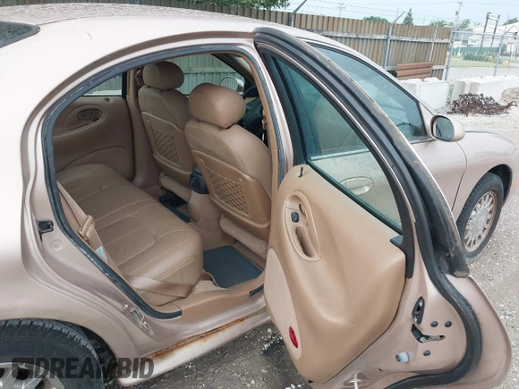 1996 Mercury Sable LS z VIN 1MELM53S1TG638988, wystawiony jako IAAI lot #42523616 z przebiegiem 87 087 mil mil oraz . Historia ofert i sprzedaży dostępna na DreamBid. Obrazek 8.