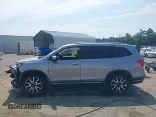 2019 Honda Pilot Elite with VIN 5FNYF6H08KB025449, listed as a IAAI auction lot 42450139 with 98,368 mi miles and . Bid and sale history available at DreamBid. Image 14.
