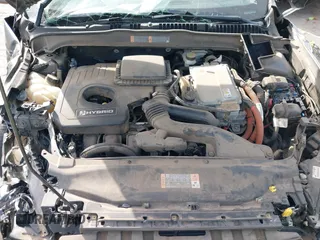 2015 Ford Fusion SE Hybrid with VIN 3FA6P0LUXFR266743, listed as a IAAI auction lot 40862039 with 116,610 mi miles. Bid and sale history available at carsss.com. Image 10.