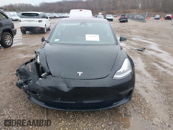 2018 Tesla Model 3 Long Range Battery with VIN 5YJ3E1EB1JF127289, listed as a IAAI auction lot 41484253 with 60,577 mi miles and . Bid and sale history available at DreamBid. Image 12.