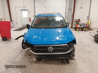 2023 Volkswagen Taos SE z VIN 3VVNX7B24PM301968, wystawiony jako IAAI lot #41155733 z przebiegiem 77 454 mil mil oraz . Historia ofert i sprzedaży dostępna na DreamBid. Obrazek 12.