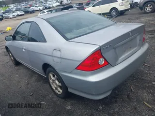 2005 Honda Civic Cpe LX with VIN 1HGEM22555L068087, listed as a IAAI auction lot 41553322 with 205,902 mi miles. Bid and sale history available at carsss.com. Image 3.