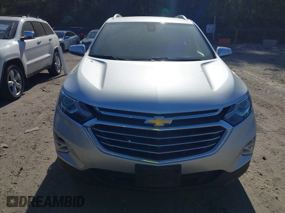 2018 Chevrolet Equinox Premier with VIN 3GNAXVEV4JS598239, listed as a IAAI auction lot 42112886 with 142,093 mi miles and . Bid and sale history available at DreamBid. Image 13.