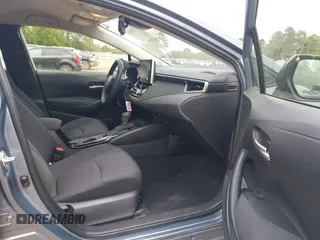 2021 Toyota Corolla LE with VIN JTDEPMAE8MJ162896, listed as a IAAI auction lot 41942669 with 99,131 mi miles. Bid and sale history available at carsss.com. Image 5.