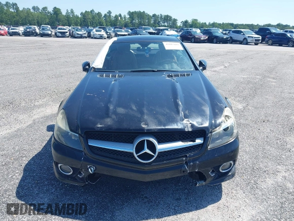 2011 Mercedes-Benz SL 550 with VIN WDBSK7BA0BF161710, listed as a IAAI auction lot 41687889 with 60,719 mi miles and . Bid and sale history available at DreamBid. Image 12.