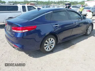 2018 Kia Optima EX with VIN 5XXGU4L32JG261985, listed as a IAAI auction lot 42083868 with 33,264 mi miles and . Bid and sale history available at carsss.com. Image 4.