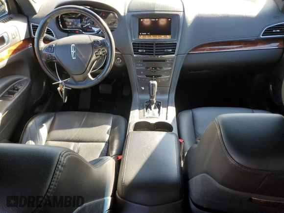 2019 Lincoln MKT with VIN 2LMHJ5NK4KBL04456, listed as a Copart auction lot 74604894 with 106,918 mi miles and Salvage Title. Bid and sale history available at DreamBid. Image 8.
