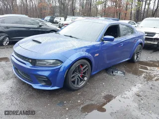 2020 Dodge Charger Scat Pack with VIN 2C3CDXGJ9LH210058, listed as a IAAI auction lot 41795400 with 12,554 mi miles. Bid and sale history available at carsss.com. Image 2.