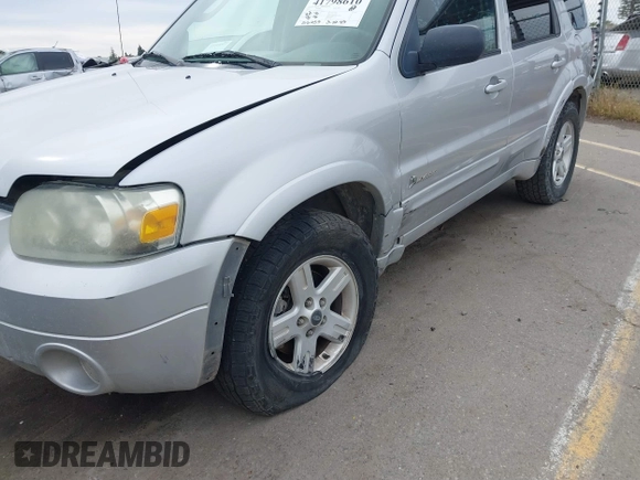 2005 Ford Escape Hybrid with VIN 1FMCU95H05KC95225, listed as a IAAI auction lot 41798610 with 216,659 mi miles and . Bid and sale history available at DreamBid. Image 6.