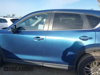 2021 Mazda CX-5 Touring with VIN JM3KFACM5M0332718, listed as a IAAI auction lot 41905933 with 30,930 mi miles. Bid and sale history available at carsss.com. Image 15.