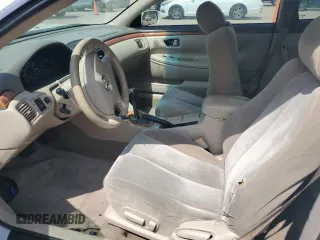 2002 Toyota Solara SE z VIN 2T1CE22P42C005554, wystawiony jako Copart lot #57756005 z przebiegiem 317 340 mil mil oraz Szkoda całkowita • Salvage title. Historia ofert i sprzedaży dostępna na DreamBid. Obrazek 7.
