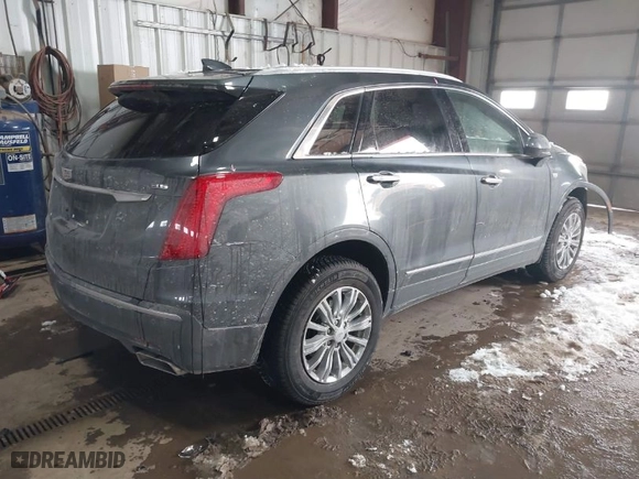 2018 Cadillac XT5 Luxury FWD with VIN 1GYKNCRS3JZ132726, listed as a IAAI auction lot 41572809 with NaN miles. Bid and sale history available at carsss.com. Image 4.