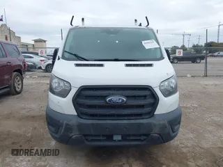 2020 Ford Transit Cargo with VIN 1FTYE1Y87LKA39598, listed as a IAAI auction lot 40989107 with 267,407 mi miles and . Bid and sale history available at DreamBid. Image 12.