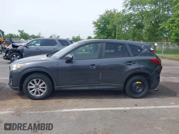 2016 Mazda CX-5 Touring z VIN JM3KE4CY4G0692655, wystawiony jako IAAI lot #42318657 z przebiegiem 212 826 mil mil oraz . Historia ofert i sprzedaży dostępna na DreamBid. Obrazek 14.