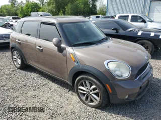 2011 MINI Countryman S with VIN WMWZC3C56BWH97944, listed as a Copart auction lot 58071315 with 176,528 mi miles and Clean title. Bid and sale history available at DreamBid. Image 4.