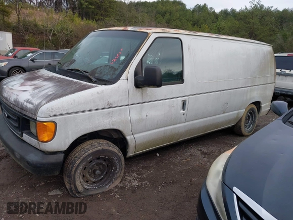 2003 Ford Econoline Cargo with VIN 1FTRE14203HB80127, listed as a IAAI auction lot 41462657 with 111,758 mi miles and . Bid and sale history available at DreamBid. Image 2.