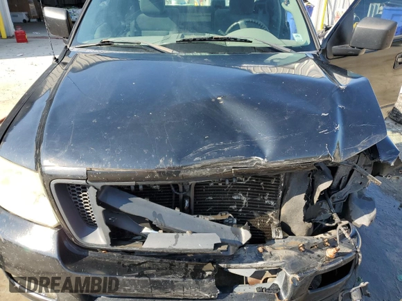 2005 Ford F-150 XL with VIN 1FTRF12WX5NA21395, listed as a Copart auction lot 44260355 with 261,053 mi miles and Salvage Title. Bid and sale history available at carsss.com. Image 11.