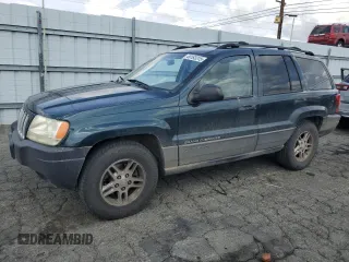 2004 Jeep Grand Cherokee Laredo z VIN 1J4GX48N94C397241, wystawiony jako Copart lot #49183315 z przebiegiem 189 099 mil mil oraz Szkoda całkowita • Salvage title. Historia ofert i sprzedaży dostępna na DreamBid. Obrazek 1.