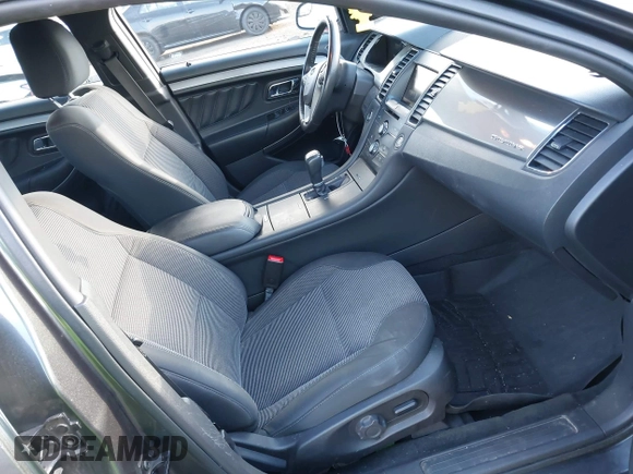 2015 Ford Taurus SEL with VIN 1FAHP2H86FG174102, listed as a IAAI auction lot 40997366 with 132,543 mi miles. Bid and sale history available at carsss.com. Image 5.