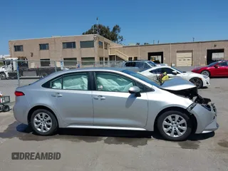 2020 Toyota Corolla LE with VIN JTDEPRAE9LJ020990, listed as a IAAI auction lot 42087507 with 54,314 mi miles and . Bid and sale history available at DreamBid. Image 13.