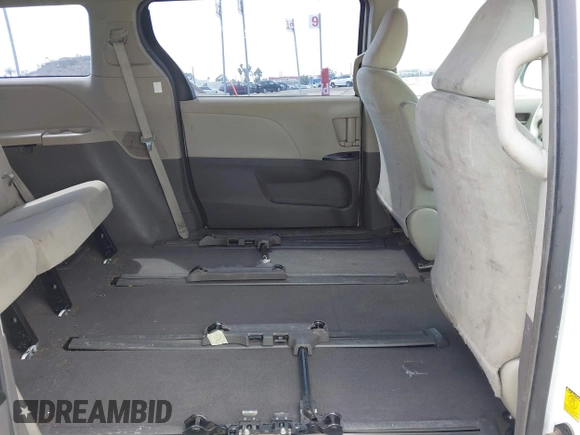 2011 Toyota Sienna with VIN 5TDZK3DCXBS011806, listed as a IAAI auction lot 41999946 with 219,907 mi miles. Bid and sale history available at carsss.com. Image 8.