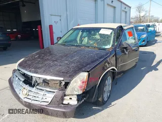 2008 Cadillac DTS 1SC z VIN 1G6KD57Y48U182797, wystawiony jako IAAI lot #41950105 z przebiegiem 96 274 mil mil oraz . Historia ofert i sprzedaży dostępna na DreamBid. Obrazek 2.