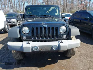 2014 Jeep Wrangler Sport with VIN 1C4AJWAG1EL314651, listed as a IAAI auction lot 41881814 with 222,483 mi miles and . Bid and sale history available at carsss.com. Image 12.