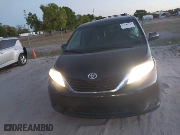 2015 Toyota Sienna LE AAS with VIN 5TDKK3DC2FS685245, listed as a IAAI auction lot 41849185 with 141,545 mi miles. Bid and sale history available at carsss.com. Image 12.