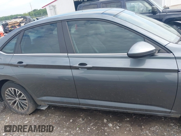 2019 Volkswagen Jetta SEL z VIN 3VWE57BU6KM009492, wystawiony jako IAAI lot #42104094 z przebiegiem 137 087 mil mil oraz . Historia ofert i sprzedaży dostępna na DreamBid. Obrazek 13.