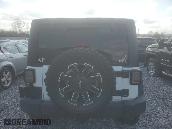2016 Jeep Wrangler Unlimited Rubicon with VIN 1C4HJWFG4GL121906, listed as a Copart auction lot 48995385 with 96,632 mi miles and Salvage Title. Bid and sale history available at carsss.com. Image 6.