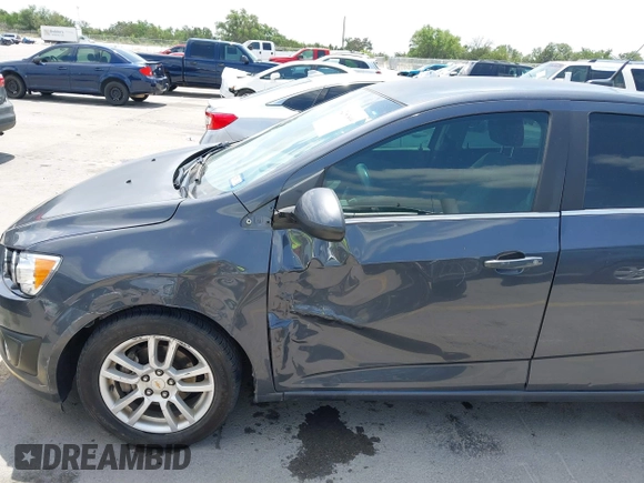 2012 Chevrolet Sonic LT with VIN 1G1JC5SH1C4182616, listed as a IAAI auction lot 42081899 with 92,802 mi miles and . Bid and sale history available at DreamBid. Image 6.