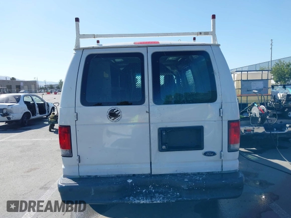 2013 Ford Econoline Cargo Commercial with VIN 1FTNE1EW7DDA98789, listed as a IAAI auction lot 42382594 with 251,602 mi miles and . Bid and sale history available at DreamBid. Image 16.