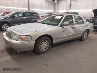 2006 Mercury Grand Marquis LS Premium with VIN 2MEFM75V86X652742, listed as a IAAI auction lot 41839679 with 212,821 mi miles. Bid and sale history available at carsss.com. Image 2.