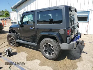 2013 Jeep Wrangler Sport с VIN 1C4AJWAG0DL569385, выставлен на аукционе Copart как лот 63094935 с пробегом 138 825 миль миль и Списание • Salvage title. История ставок и продаж доступна на DreamBid. Изображение 2.