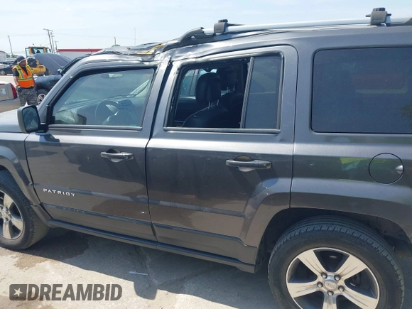 2016 Jeep Patriot Latitude with VIN 1C4NJRFB7GD658594, listed as a IAAI auction lot 42066483 with 146,492 mi miles. Bid and sale history available at carsss.com. Image 14.